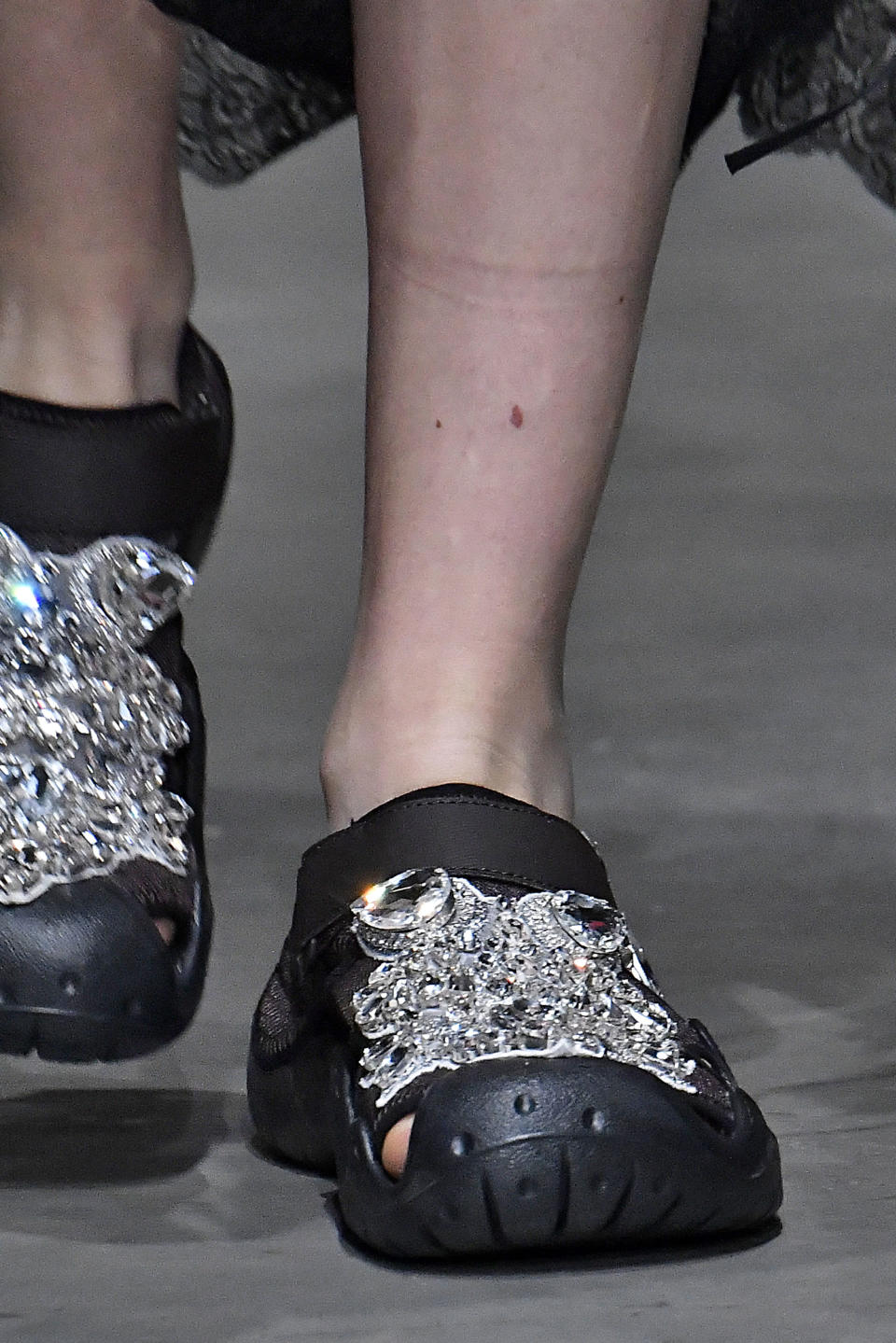 These shoes CLEARLY make a statement.&nbsp; (Photo: Victor VIRGILE via Getty Images)