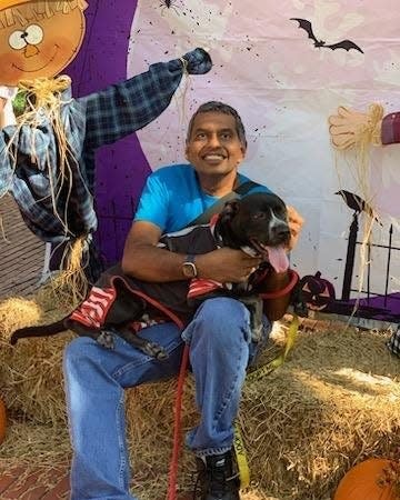 Butch Krishnamurti with Midnight at a recent adoption event
