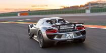 <p>The 918 Spyder has what Porsche calls "top pipes" or <a href="https://www.roadandtrack.com/new-cars/road-tests/reviews/a6185/8-more-things-porsche-918/" rel="nofollow noopener" target="_blank" data-ylk="slk:top-exit exhaust pipes;elm:context_link;itc:0;sec:content-canvas" class="link ">top-exit exhaust pipes</a>. <a href="http://flatsixes.com/cars/porsche-918-spyder-cars/porsches-918-spyder-exhaust-exit-top-pipes/" rel="nofollow noopener" target="_blank" data-ylk="slk:These help the 918;elm:context_link;itc:0;sec:content-canvas" class="link ">These help the 918</a> save weight (because there's less actual pipe used) and reduce back pressure. The 918's engine is derived from <a href="https://www.roadandtrack.com/motorsports/videos/a26880/take-a-ride/" rel="nofollow noopener" target="_blank" data-ylk="slk:the RS Spyder race car;elm:context_link;itc:0;sec:content-canvas" class="link ">the RS Spyder race car</a> so that's why it sounds more race car than road car. <a href="https://www.ebay.com/itm/2015-Porsche-918-Spyder/254614733319?hash=item3b48388207:g:21IAAOSwyoJe1ZXX" rel="nofollow noopener" target="_blank" data-ylk="slk:This two-tone example;elm:context_link;itc:0;sec:content-canvas" class="link ">This two-tone example</a> is for sale for the low, low price of $1.64 million. </p>