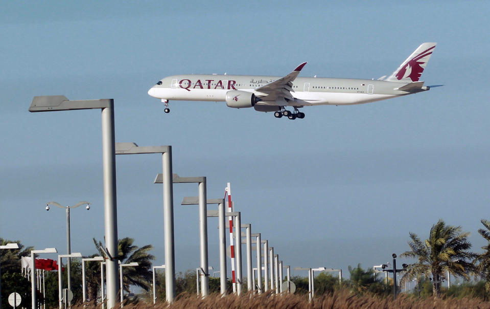 <p>A Qatar Airways plane is seen in Doha, Qatar June 5, 2017. (Photo: Stringer/Reuters) </p>