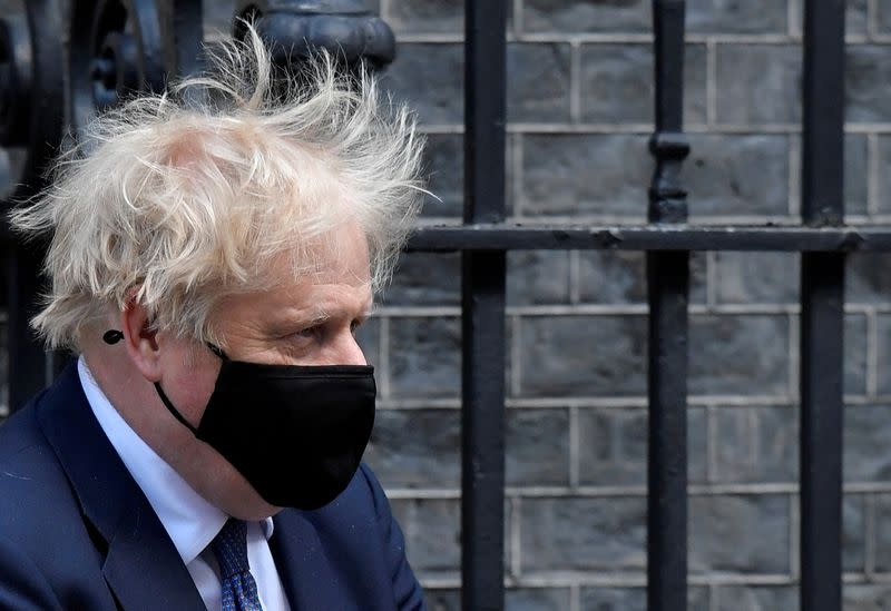 FILE PHOTO: Britain's PM Johnson outside Downing Street in London