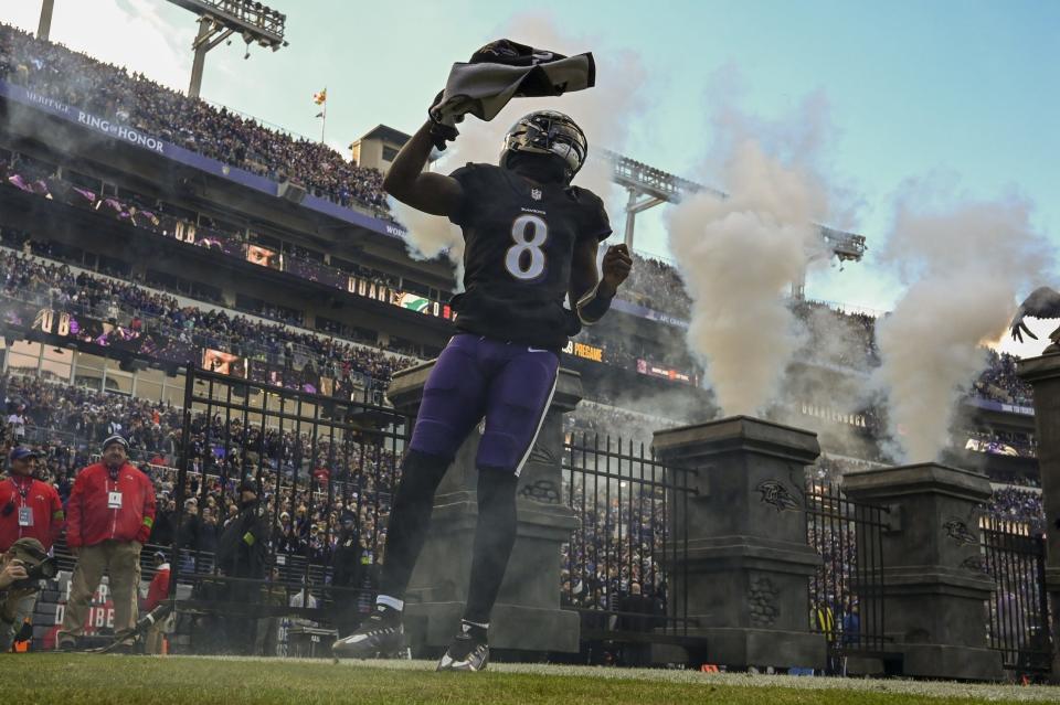 Dec 31, 2023; Baltimore, Maryland, USA; Baltimore Ravens quarterback Lamar Jackson (8) enters the field before the game against the Miami Dolphins at M&T Bank Stadium. Mandatory Credit: Tommy Gilligan-USA TODAY Sports