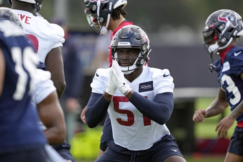 FILE - Houston Texans linebacker Will Anderson Jr. (51) stretches during a rookie football minicamp practice Friday, May 12, 2023, in Houston. The Texans beefed up their defense by trading up to nab Anderson, a defensive end from Alabama with the third pick in the draft. (AP Photo/David J. Phillip, File)