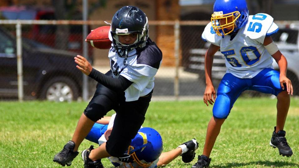 PHOTO: Stock photo of children playing tackle football. (Actionpics/Getty Images)