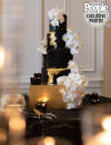 <p>The four-tiered cake was dressed with black fondant, gold leaf and white orchids, and was created by French pastry chef Yannick Dumonceau. </p> <p>In addition to the cake, a dessert bar featured fruit tarts, nut-free brownies, eclairs, coconut cheesecakes, a macaron tower and miniature waffle cones.</p> <p>Later in the evening, made-to-order cotton candy and wood-fired pizza refueled guests, keeping everyone dancing well past midnight. </p>