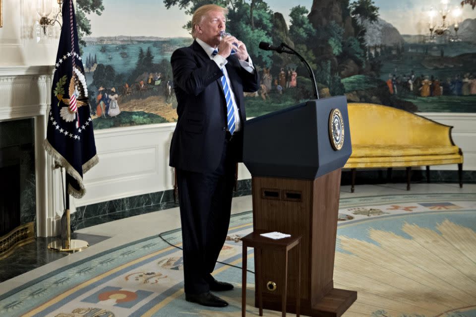 Finally he managed to get his hands on a bottle of Fiji water. Photo: Getty Images