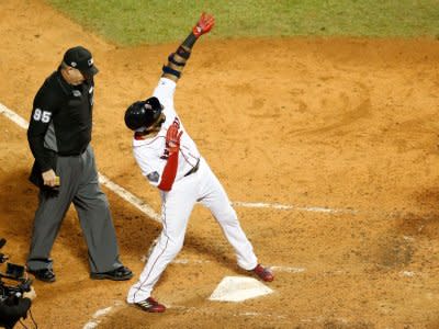 Oct 23, 2018; Boston, MA, USA; Boston Red Sox pinch hitter Eduardo Nunez (36) celebrates after hitting a three run home run against the Los Angeles Dodgers in game one of the 2018 World Series at Fenway Park. Mandatory Credit: Greg M. Cooper-USA TODAY Sports