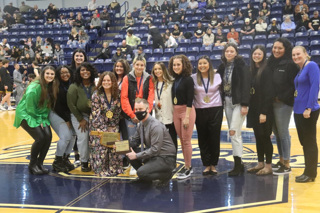 Members of the 2011-12 Shawnee High School girls' state basketball championship team reunited for an SHS Hall of Fame ceremony last Friday.