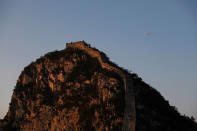 <p>An airplane flies over the Jiankou section of the Great Wall, located in Huairou District, north of Beijing, China, June 7, 2017. (Photo: Damir Sagolj/Reuters) </p>