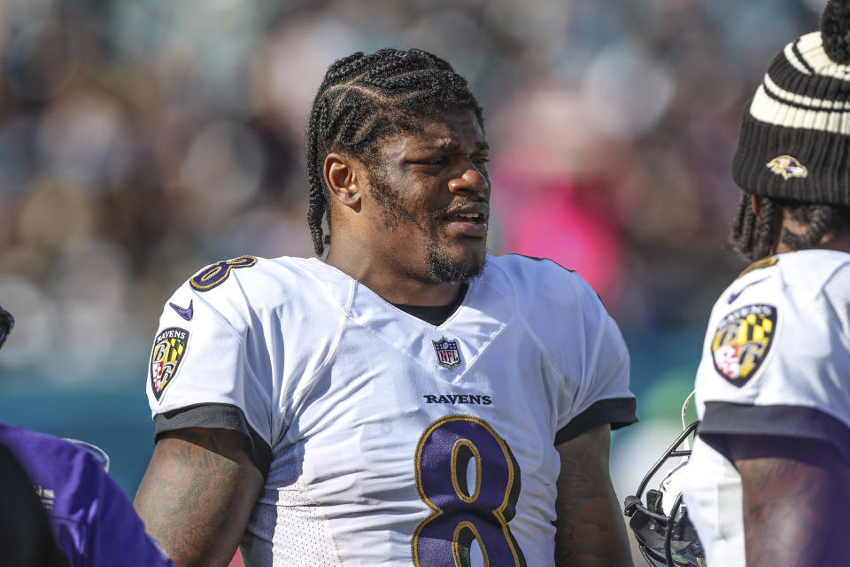 Baltimore Ravens QB Lamar Jackson has missed the last five games with a knee injury and may miss Sunday's playoff matchup agains the Cincinnati Bengals. (AP Photo/Gary McCullough)