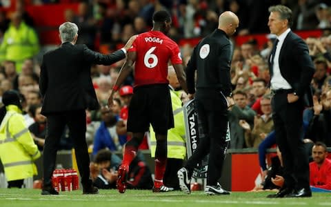 Jose Mouringo with Paul Pogba after subbing him off - Credit: Reuters