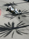 FILE - Bruno Junqueira of Brazil goes through turn three during the first day qualifying for Champ Car's Toyota Grand Prix of Long Beach, in Long Beach, Calif., in this Friday, April 8, 2005, file photo. The Grand Prix of Long Beach opens 17 months after the pandemic ended the crown jewel’s streak as one of the longest continuously-running street events in racing. (AP Photo/Mark J. Terrill, File)