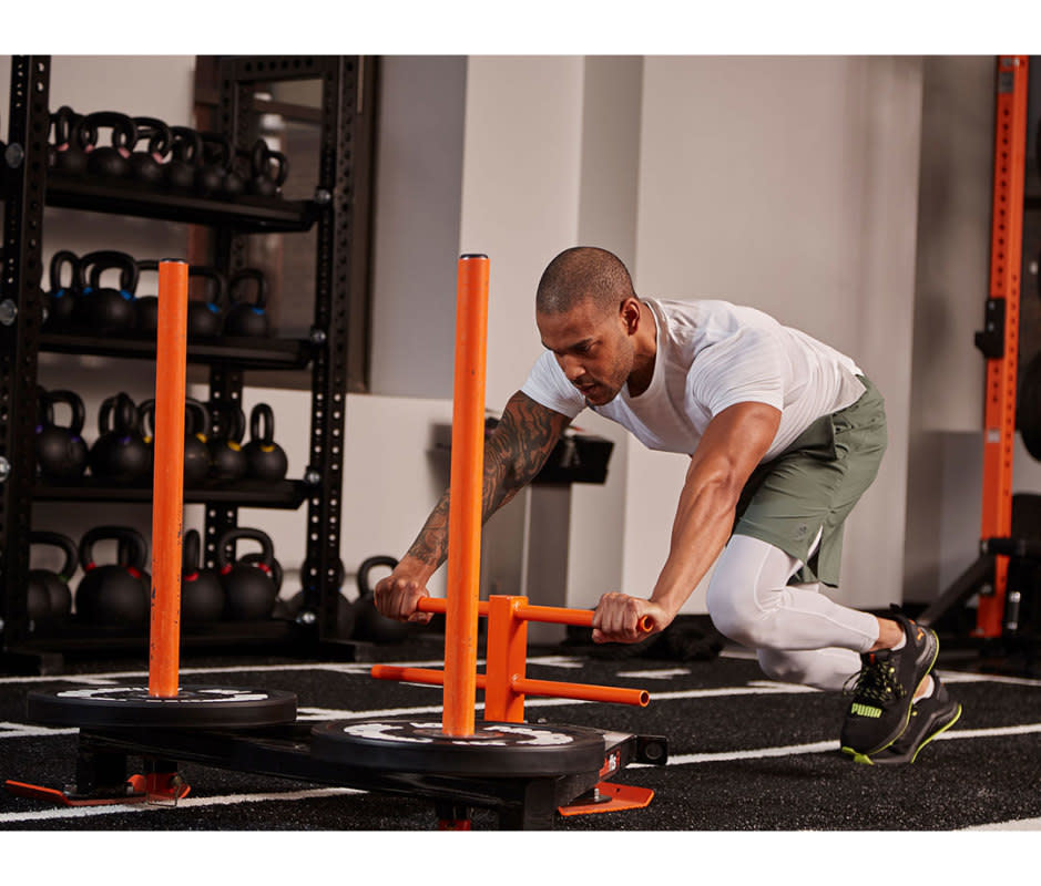 <p>Justin Steele</p>How to Do It:<ol><li>Start with hands on the high poles or the low crossbar of a sled, hips hinged forward slightly, to start. </li><li>With back straight and core engaged, drive through balls of feet and push the sled with small, quick steps. It should feel like bracing to push a broken-down car along the street. </li><li>As fast as you can, push the sled forward for 20 yards. </li><li>Turn around and drag the sled back 20 yards to the starting position. Note: You can secure a TRX strap to the sled to hold onto as you sprint back.</li><li>That's 1 rep. Perform 3-4 sets.</li></ol>Pro Tip<p>If you're new to sled drags, start with a small amount of weight and work your way up. They're harder than they look. </p>