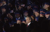 President Bush also got flack for opening the 2002 Salt Lake City Winter Olympic Games standing among the US athletes. Previous heads of state opened the games from an official box. (Photo by Doug Pensinger/Getty Images)