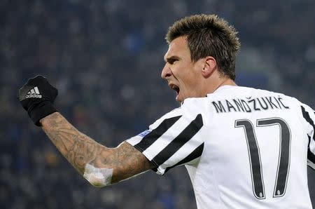 Football Soccer- Juventus v Manchester City - UEFA Champions League Group Stage - Group D - Juventus stadium, Turin, Italy - 25/11/15 Juventus' Mario Mandzukic celebrates after scoring the first goal for Juventus. Reuters/Giorgio Perottino