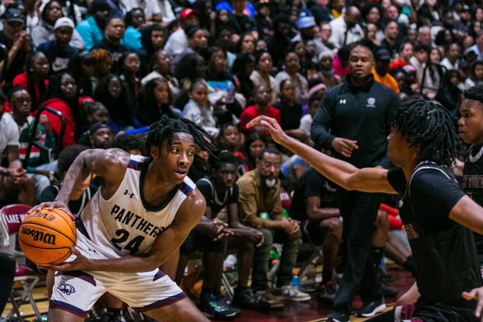 Dwyer guard Jaelen Nelson (24) handles the ball outside the Lake Worth perimeter during the first half of the game between Dwyer and host Lake Worth on Tuesday, January 31, 2023, in Lake Worth Beach, FL. Final score, Lake Worth, 62, Dwyer, 57.