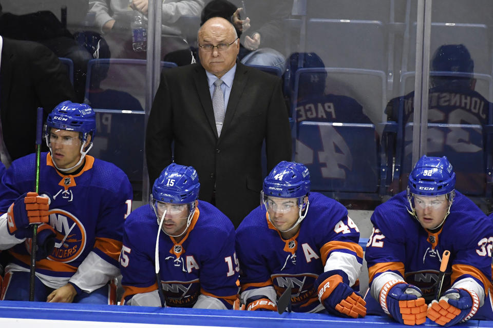 New York Islanders head coach Barry Trotz watches during an NHL preseason hockey game against the New Jersey Devils, Saturday, Oct. 2, 2021, in Bridgeport, Conn. (AP Photo/Jessica Hill)