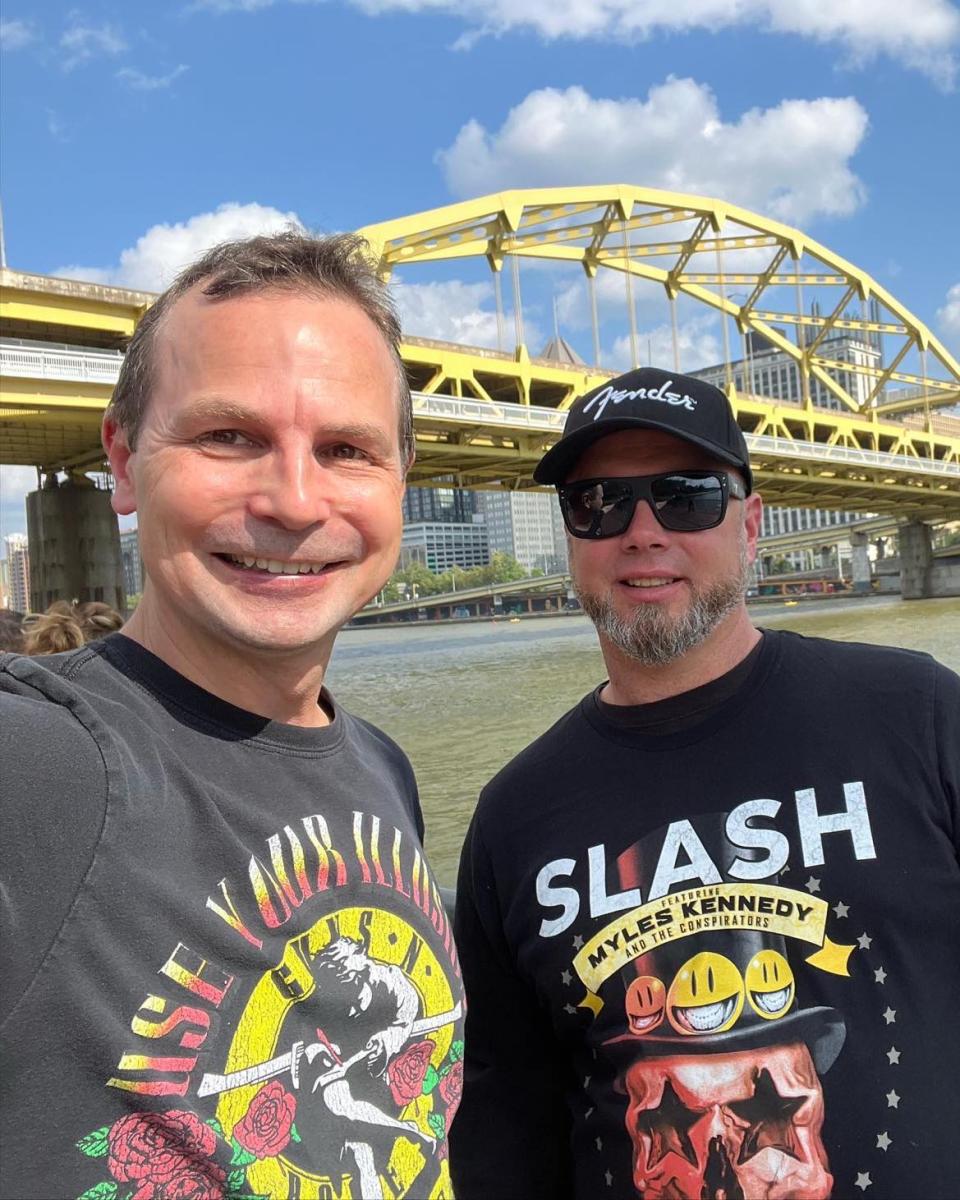 Ed Balint (left), entertainment writer for The Canton Repository, is shown with friend Charley Moon in downtown Pittsburgh prior to the Guns N' Roses concert at PNC Park.