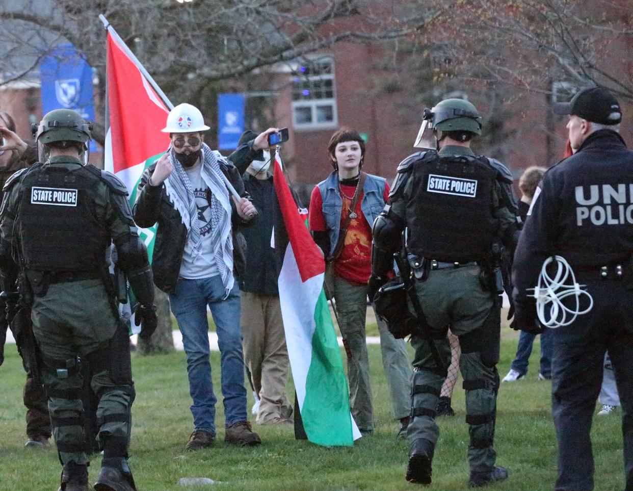 Police took action to remove and arrest pro-Palestinian protesters who started setting up an encampment in front of the University of New Hampshire's Thompson Hall Tuesday night May 1, 2024.