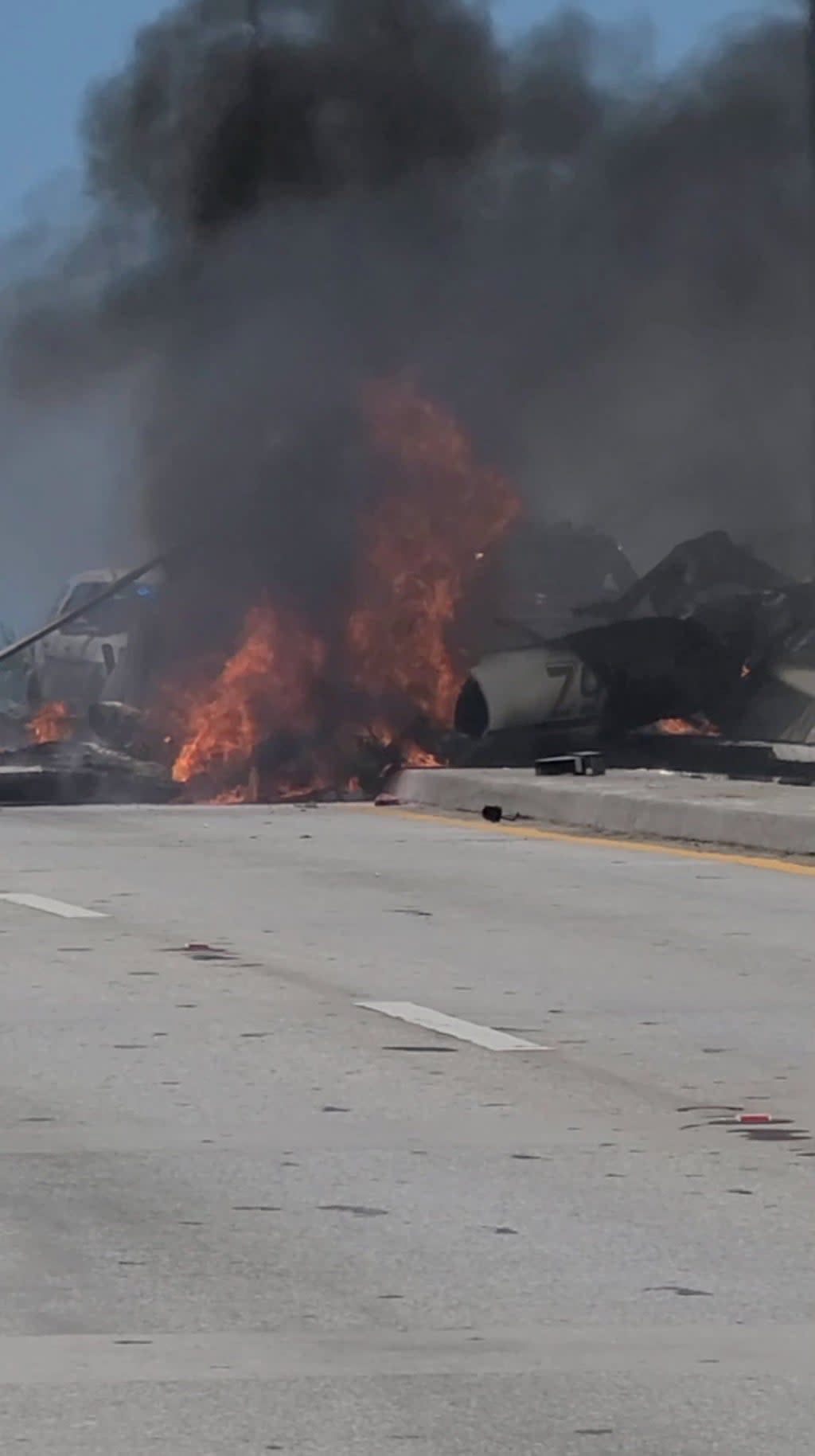 Plane crashes onto Haulover Inlet Bridge, Miami (Chad Raney via Reuters)