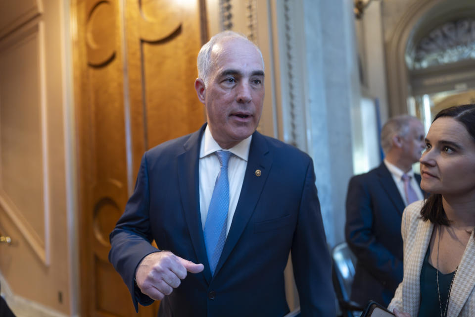 Sen. Bob Casey, D-Pa., arrives at the chamber as the Senate prepares to advance the $95 billion aid package for Ukraine, Israel and Taiwan passed by the House, at the Capitol in Washington, Tuesday, April 23, 2024. (AP Photo/J. Scott Applewhite)