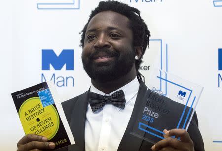 Marlon James, author of "A Brief History of Seven Killings", poses for photographers after winning the Man Booker Prize for Fiction 2015 in London, Britain October 13, 2015. REUTERS/Neil Hall