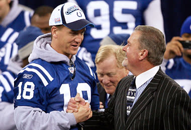 Peyton Manning with Colts owner Jim Irsay Jr on stage at the Super Bowl victory celebration at the RCA Dome on Feb. 5, 2007