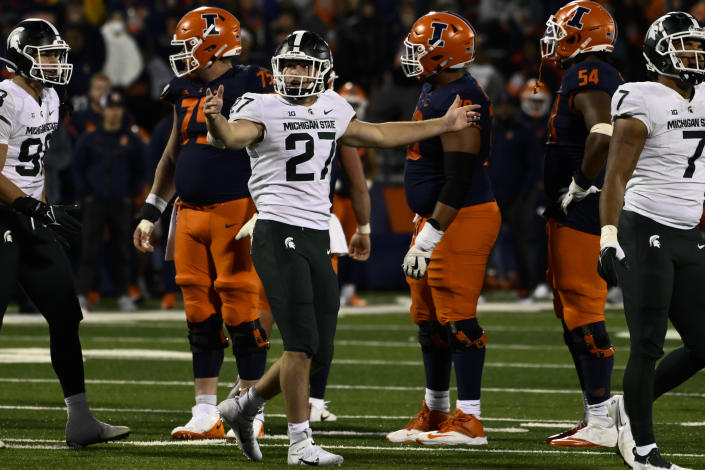 Michigan State linebacker Cal Haladay (27) reacts after an NCAA college football game against Illinois, Saturday, Nov. 5, 2022, in Champaign, Ill. (AP Photo/Matt Marton)