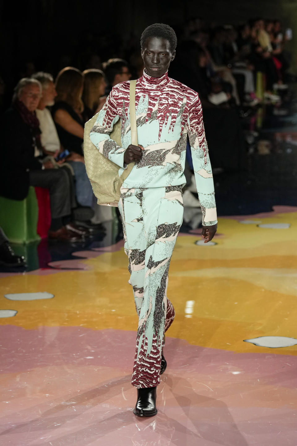 A model wears a creation as part of the Bottega Veneta women's Spring Summer 2023 collection presented in Milan, Italy, Saturday, Sept. 24, 2022. (AP Photo/Antonio Calanni)