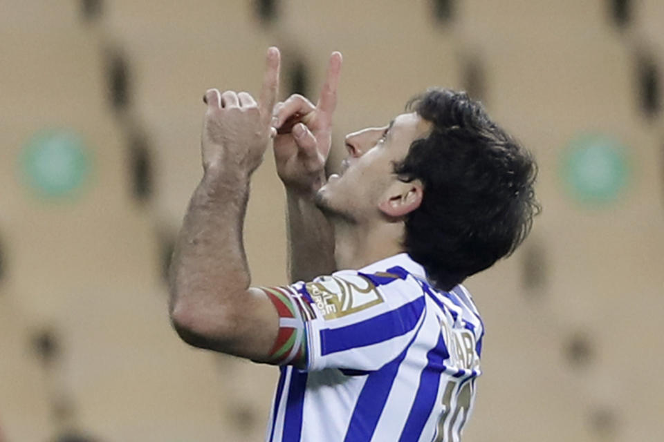 Real Sociedad's Mikel Oyarzabal celebrates scoring his side's first goal with a penalty shot during the final of the 2020 Copa del Rey, or King's Cup, soccer match between Athletic Bilbao and Real Sociedad at Estadio de La Cartuja in Sevilla, Spain, Saturday April 3, 2021. The game is the rescheduled final of the 2019-2020 competition which was originally postponed due to the coronavirus pandemic. (AP Photo/Angel Fernandez)