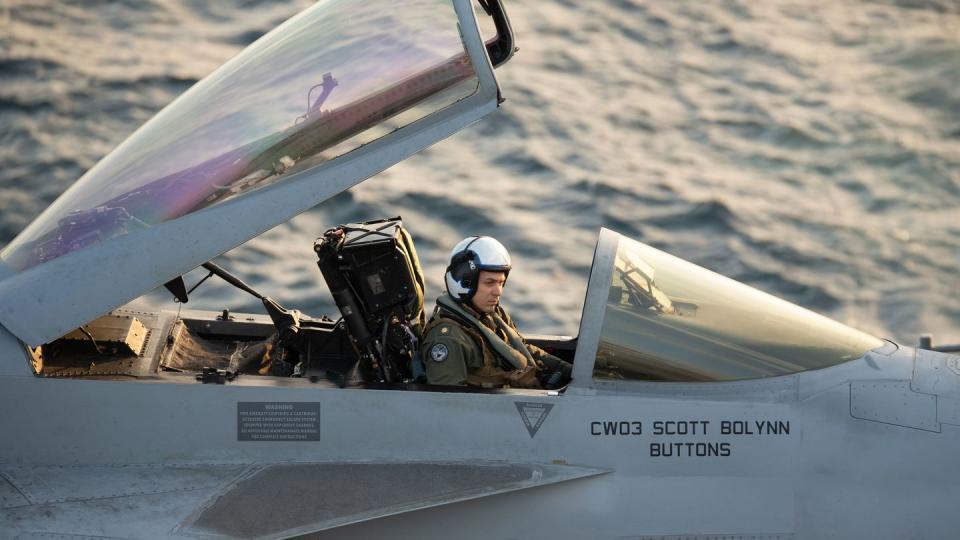 Lt. Cmdr. Galen Ober, assigned to Strike Fighter Squadron 37, conducts preflight checks of an F/A-18E Super Hornet on the flight deck of the aircraft carrier Gerald R. Ford March 7. (MC2 Nolan Pennington/Navy)