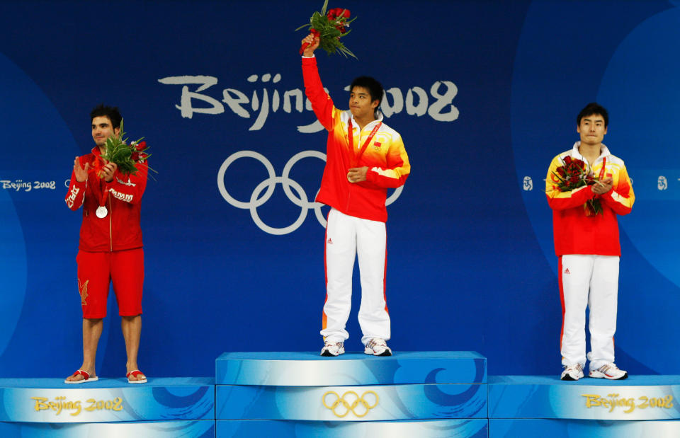 BEIJING - AUGUST 19: (L-R) Silver medalist Alexandre Despatie of Canada, gold medalist He Chong of China and bronze medalist Qin Kai of China pose with their medals after winning the Men's 3m Springboard Fiinal at the National Aquatics Center on Day 11 of the Beijing 2008 Olympic Games on August 19, 2008 in Beijing, China. (Photo by Streeter Lecka/Getty Images)