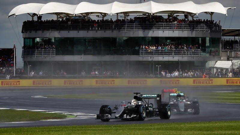 A photo of two Mercedes F1 cars at the 2016 British Grand Prix. 
