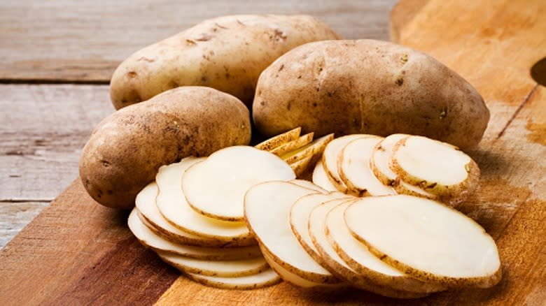 whole and sliced potatoes