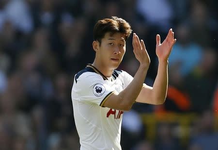 Britain Football Soccer - Tottenham Hotspur v Watford - Premier League - White Hart Lane - 8/4/17 Tottenham's Son Heung-min applauds the fans as he is substituted off Action Images via Reuters / Paul Childs Livepic EDITORIAL USE ONLY. No use with unauthorized audio, video, data, fixture lists, club/league logos or "live" services. Online in-match use limited to 45 images, no video emulation. No use in betting, games or single club/league/player publications. Please contact your account representative for further details. - RTX34P7S