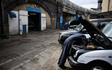 Black cabs garage - Credit: Leon Neal /Getty