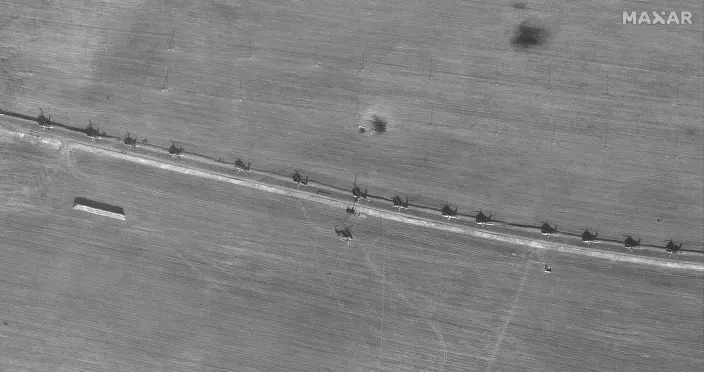 This image shows some of the helicopters deployed on a road southeast of Chojniki, Belarus, on Feb. 25, 2022. (Satellite image ©2022 Maxar Technologies)