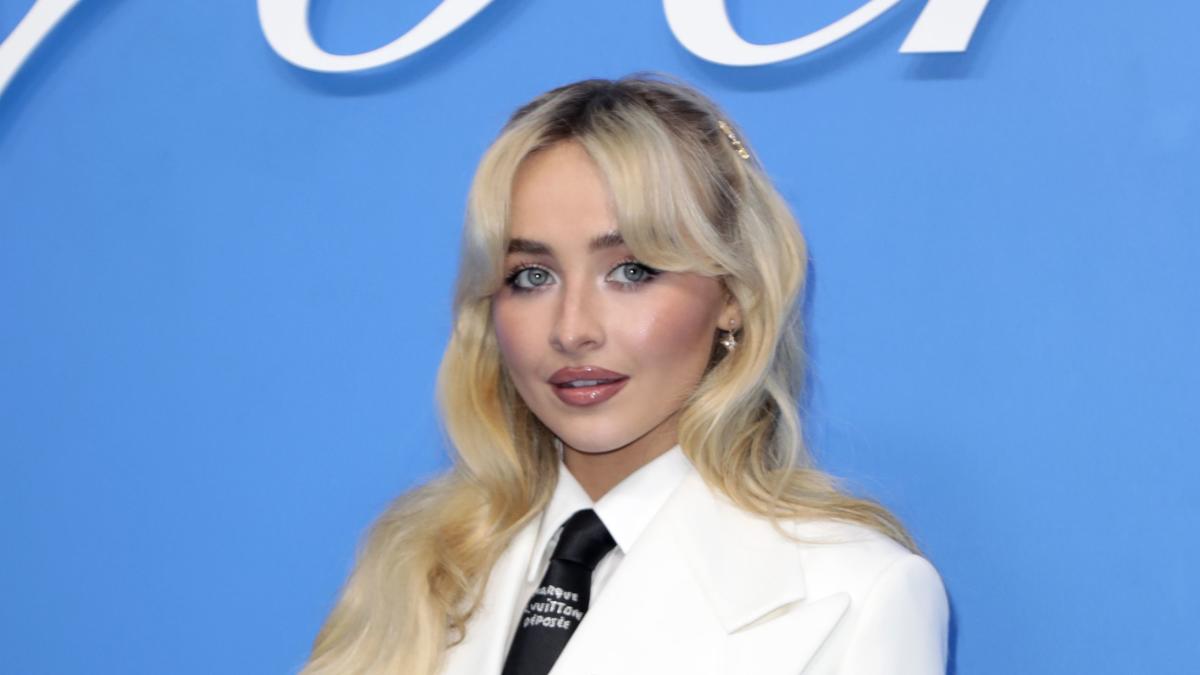 Sabrina Carpenter Wears White Suit Blazer for a Chic Pantsless Look