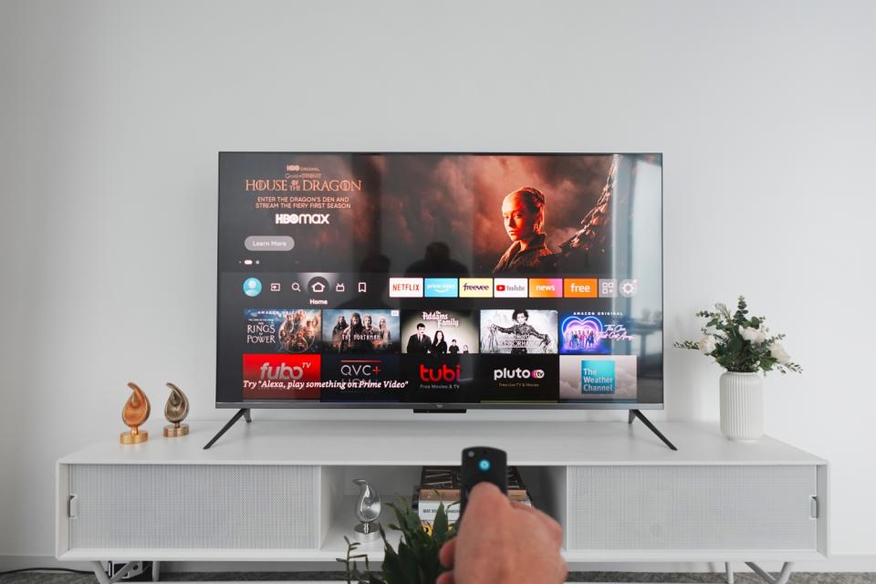 Amazon Fire TV Omni QLED Series in a living room setting