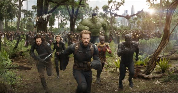 Characters from Avengers: Infinity War, led by Captain America run towards an unseen foe.