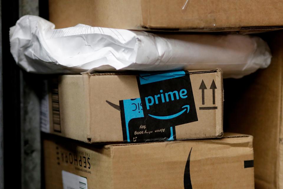 Consumers who love to shop online are warned about various scams that could kick up around Amazon Prime Day, which runs 36-hours this year and begins Monday afternoon. File photo, a package from Amazon Prime is loaded for delivery in New York.  (AP Photo/Mark Lennihan, File)