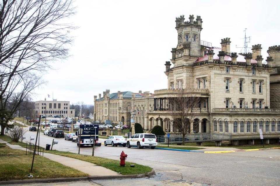 An Iowa Department of Public Safety Division of Criminal Investigation truck pulls up outside the Anamosa State Penitentiary on March 23, after prisoners attempting to escape killed a nurse and guard there.