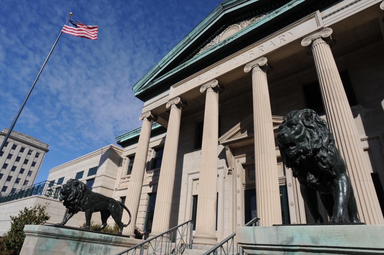 FILE - Exterior of the Oshkosh Public Library, showing lions 'Sawyer' and 'Harris.'