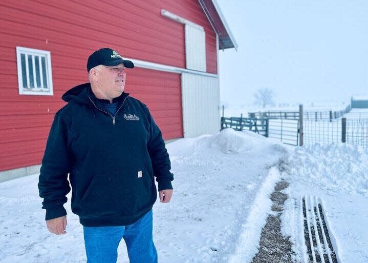 Craig Schaunaman, who farms thousands of acres near Aberdeen, looks out over his family farm.