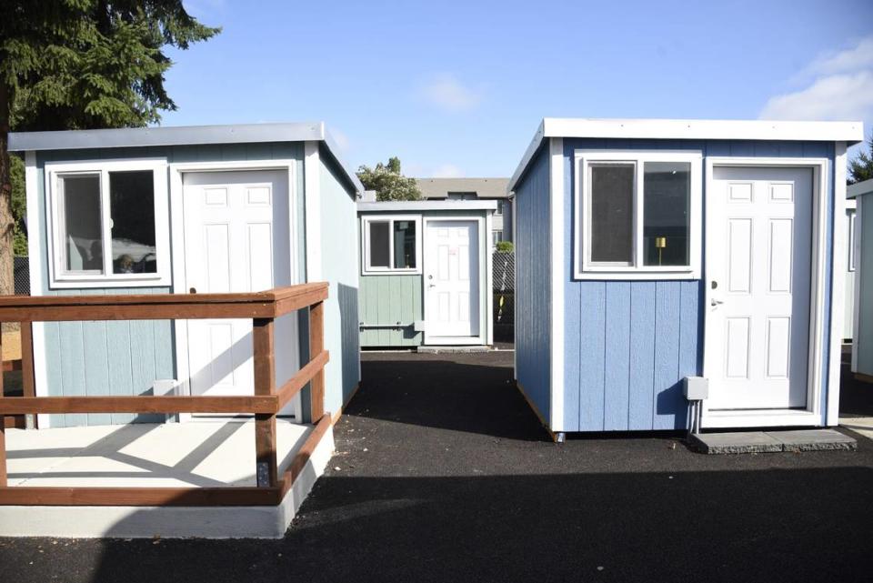 A row of tiny homes in the newly-opened tiny home village off of Franz Anderson Road in Olympia on Sept. 8, 2023. Residents began moving in this week from Wheeler Road as part of an initiative to move people out of right of ways in Washington state.