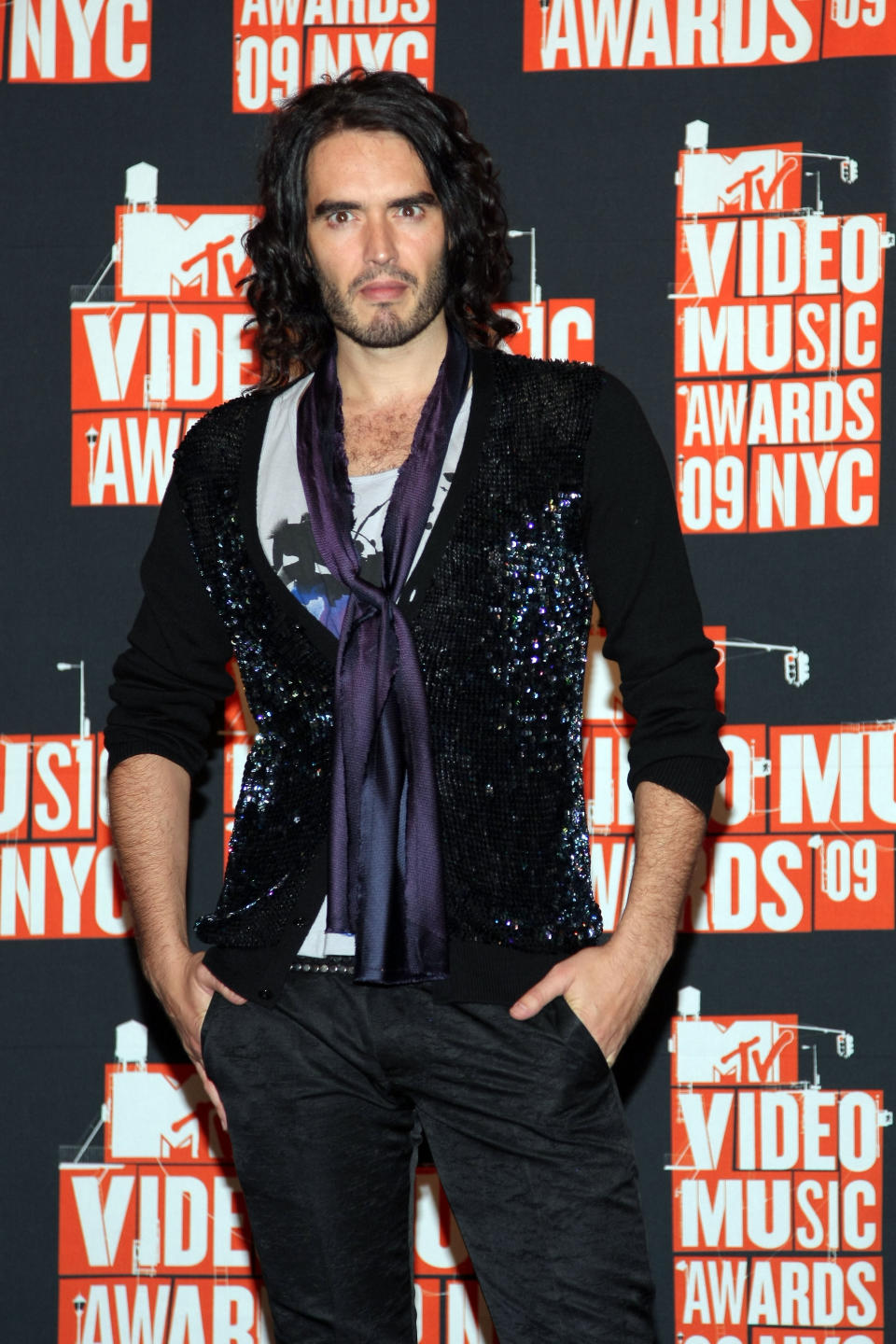 Can we just talk about the fact that Russell Brand was an awful, unfunny host who screamed dumb jokes all night? Also, he is wearing a sequin cardigan.