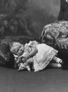 <p>Edward, the eldest son of King George V and Queen Mary, is photographed resting on a pillow at around 6 months old. In 1936, Edward officially became King Edward VIII but abdicated the throne in less than one year so he could marry American divorcée Wallis Simpson. Edward's brother, King George VI, took over the throne, while Edward became the Duke of Windsor.</p>