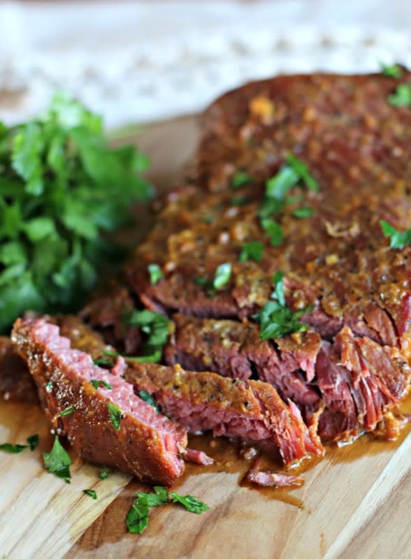 <p>The Magical Slow Cooker</p><p>The flavor of the sauce on this corned beef can't be matched! This corned beef is great with red mashed potatoes.</p><p><strong>Get the Recipe:</strong><a href="https://www.themagicalslowcooker.com/slow-cooker-maple-mustard-corned-beef/" rel="nofollow noopener" target="_blank" data-ylk="slk:Slow Cooker Maple Mustard Corned Beef;elm:context_link;itc:0;sec:content-canvas" class="link "><strong> S</strong><strong>low Cooker Maple Mustard Corned Beef</strong></a></p>