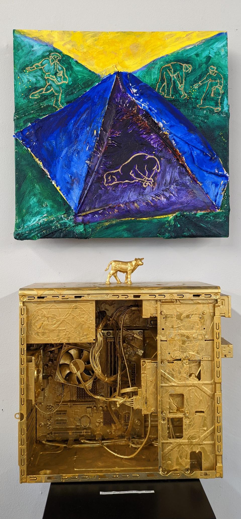 Tom Wachunas' art in his newest exhibit, "Signs and Wonderings" makes use of such ancient biblical symbols as the lamb and the golden calf, and such modern items such as technology.