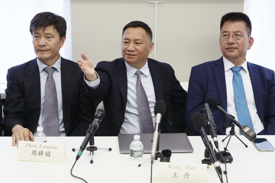 Members of the June 4 Massacre Memorial Association committee from right to left; Yu David, Wang Dan, also known as Dan Wang, and Zhou Fengsuo listen questions during a press conference at the June 4th Memorial Exhibit on Thursday, June 1, 2023, in New York. The exhibit will open Friday, June 2, 2023, in New York, ahead of the June 4 anniversary of the violence that ended China's 1989 Tiananmen protests. (AP Photo/Andres Kudacki)